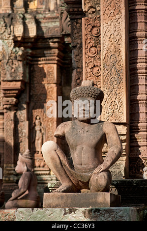 Statue of Yaksha as a temple guardian, Mandapa of central sanctuary, Banteay Srei temple, Citadel of the Women, Angkor, Cambodia Stock Photo