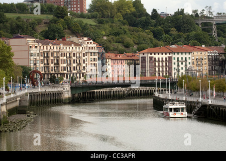 View of Ayuntamiento and old town from Zubizuri bridge (ponte) & Nervion River, Bilbao, Spain Stock Photo