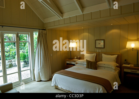 Taupo a bedroom suite of the Huka Lodge luxury accommodation Stock ...