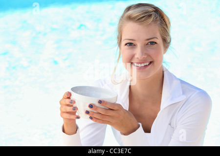 Woman holding a bowl Stock Photo