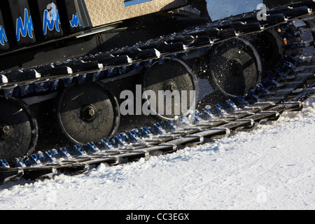 Working Piste machine (snow cat) detail - preparation ski slope Stock Photo
