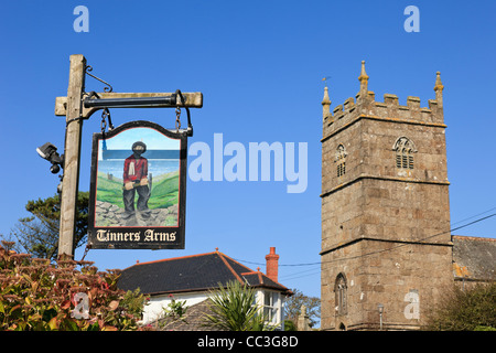 Zennor Cornwall England UK Britain. Tinners Arms village pub sign and St Senara church tower Stock Photo