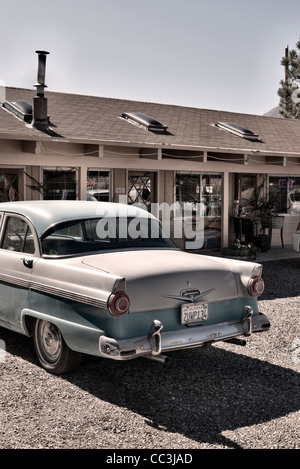 1960's Ford Fairlane parked outside a diner in California USA Stock Photo