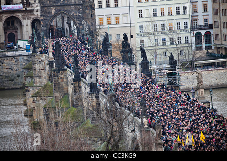 People follow funeral car with remains of Vaclav Havel, the first president of Czech Republic and the last president of Stock Photo