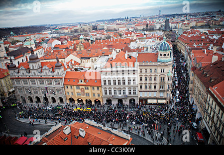 People follow funeral car with remains of Vaclav Havel, the first president of Czech Republic and the last president of Stock Photo