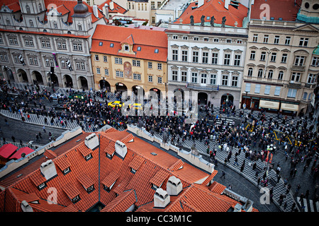 People follow funeral car with remains of Vaclav Havel, the first president of Czech Republic and the last president of Stock Photo