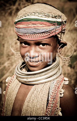 Portrait of young girl from the distinctive Bonda tribe at Onukudelli market in Machkund River Valley,  Orissa, Eastern India. Stock Photo