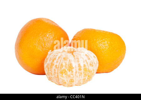 Fresh Satsumas Oranges Peeled and Unpeeled ( Focus On The Peeled Satsuma) Vitamin C Stock Photo