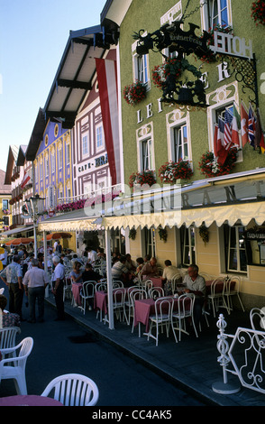 Austria, Province of Salzkammergut, Mondsee village famous for the wedding scene in 'the sound of music', street cafe's. Stock Photo