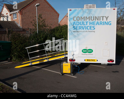 Community adult hearing services mobile unit parked in a local doctors surgery car poark Stock Photo