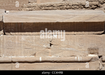 Close up of relief work on door lintel at the Roman fortress and Temple of Dush, South of Kharga Oasis, Western Desert of Egypt Stock Photo