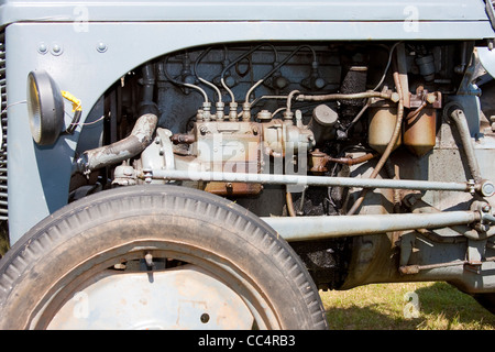 Vintage Grey Tractor Detail of Engine and Wheel Stock Photo