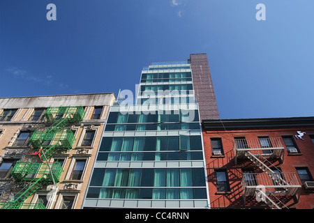 Modern and older buildings in New York City's Chinatown Stock Photo