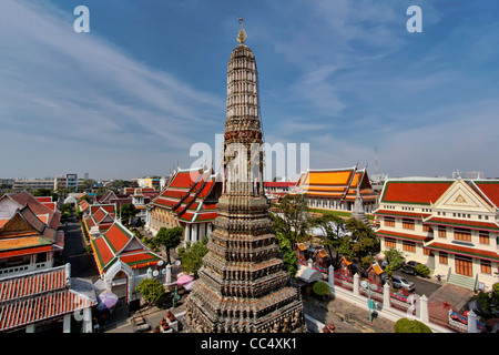 View of one of the satellite prangs and roofs of temples within the temple complex of Wat Arun (Temple of Dawn) in Bangkok, Thai Stock Photo