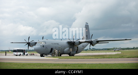 KECSKEMET, HUNGARY - AUGUST 8, 2010: cargo transporter C-130H Hercules is getting ready for take off on the airport runway Stock Photo