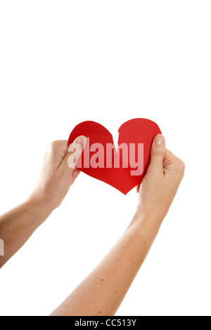 Woman hands holding paper broken heart with a family - Divorce and ...