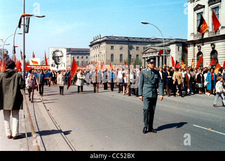 Demonstration on May 1st, 1973 in East Berlin with banners, flags and great portraits of Secretary General of the SED Honecker. Stock Photo