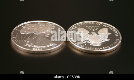Two American Eagle Silver Bullion Coins (legal tender) showing the front and back of the coin Stock Photo