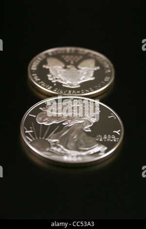 Two American Eagle Silver Bullion Coins (legal tender) showing the front and back of the coin Stock Photo