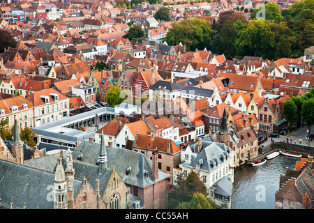 Aerial view over rooftops of Bruges (Brugge) in Flanders,Belgium with Rosary Quay bottom right and old Fish Market (Vismarkt) Stock Photo