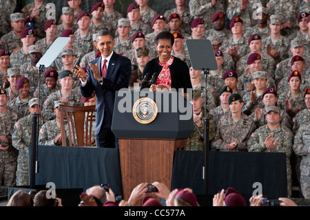 First lady Michelle Obama and President Barack Obama applaud US Service members and their families after declaring the end to the war in Iraq December 14, 2011at Pope Field at Fort Bragg, NC. Stock Photo