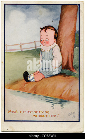 UK - CIRCA 1953: Reproduction of antique postcard with text 'What's the use of living without her' shows Stock Photo