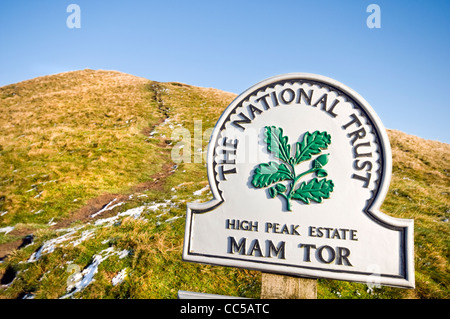 A National Trust sign on the path up to the top of Mam Tor in the Peak District National Park in Derbyshire, England Stock Photo