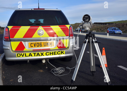 DVLA road fund licence, tax disc, detector camera in use, UK Stock Photo