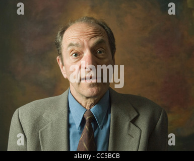 portrait of surprised man looking at camera Stock Photo