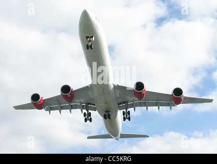 Virgin Atlantic Airbus A340-600 (G-VYOU) lands at London Heathrow Airport, England. Stock Photo