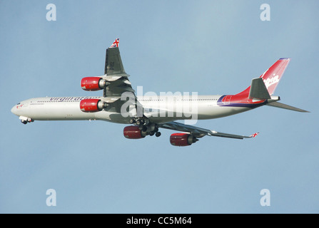 Virgin Atlantic Airbus A340-600 (G-VEIL) takes off from London Heathrow Airport, England. Stock Photo
