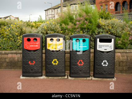 Row of sorted recycling and general waste bins in a UK town centre ...