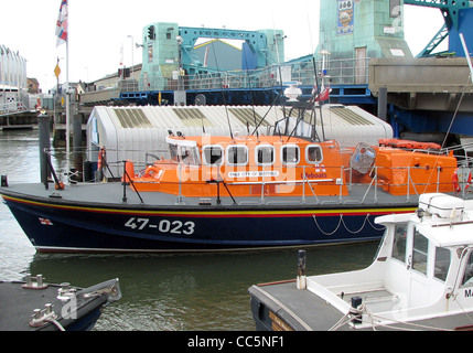 RNLI Tyne Class Lifeboat With Some Of Crew Members Preparing To Launch ...