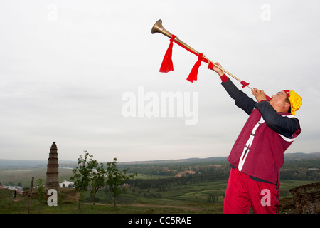 Man performing suona, Boluo Ancient Town, Yulin, Shaanxi , China Stock Photo