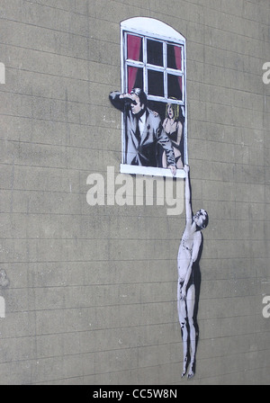 An art work by Banksy, at the bottom of Park Street, in central Bristol, England. The Council have decided not to clean it off. Stock Photo
