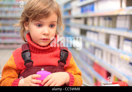 girl  in shop of household cosmetics Stock Photo