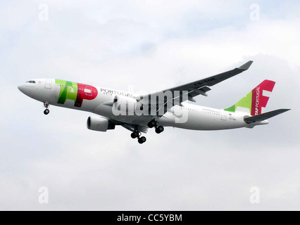 TAP (Air Portugal) Airbus A330-200, registration CS-TOE, landing at London Heathrow Airport. Stock Photo