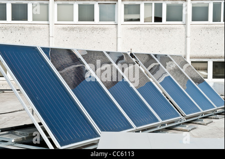 Solar panels for solar water heating on a rooftop. Stock Photo