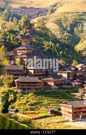 Traditional village in Longji terraces rice fields near Guilin, Guangxi province - China Stock Photo