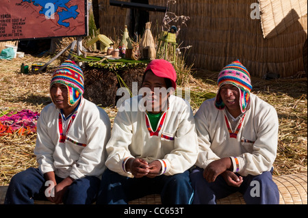 Peru, Lake Titicaca. Quechua or Uros Indians in the floating Uros Islands. Stock Photo