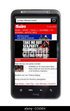 Browsing The Sun online newspaper site on an HTC smartphone Stock Photo