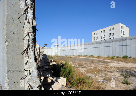 The separation wall in Bethlehem seen from the Israeli side (Palestinian homes can be seen in the background) Stock Photo