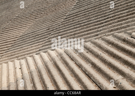 Corrugated asbestos and cement roofing material covering a backyard, Spain Stock Photo