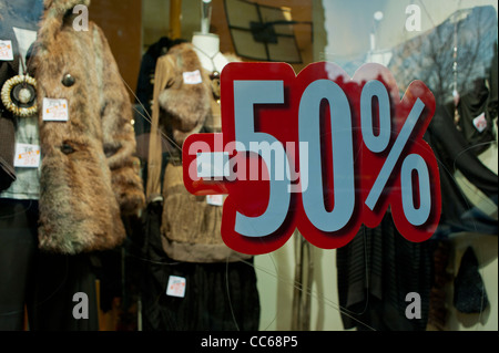 Paris, France, January sales labels on clothes in Small Business Shops, Store Windows 50% Discount Signs, fast fashion Stock Photo