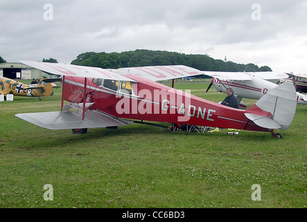 de Havilland DH87B Hornet Moth (UK registration G-ADNE, year of build 1936) at Kemble Airfield, Gloucestershire, England Stock Photo