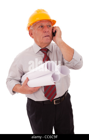 Experienced engineer talking on the phone (isolated on white) Stock Photo