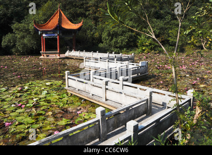 Bridge to the pavilion on lotus pond, Qingshou Rock, Duqiao Mountain, Yulin, Guangxi , China Stock Photo