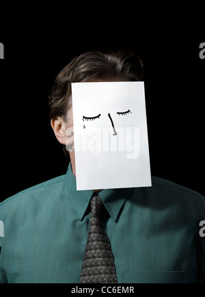Businessman with Paper drawing over Face Stock Photo