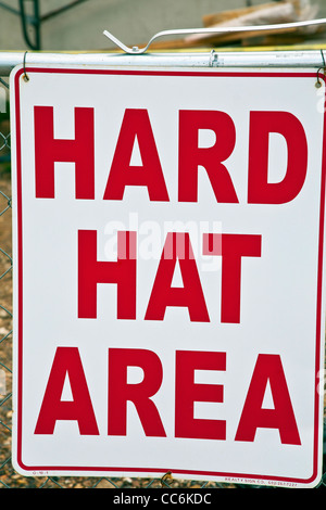 Hard hat area warning sign Stock Photo