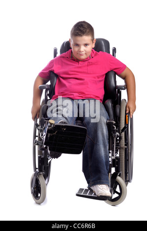 young boy in wheelchair . isolated on white background Stock Photo